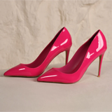 Hot pink patent leather pointed-toe stiletto heels with high heels on neutral background — Subashini Heels | Endless UAE