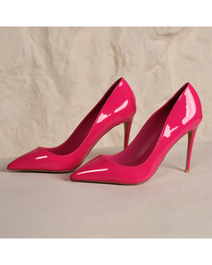 Hot pink patent leather pointed-toe stiletto heels with high heels on neutral background — Subashini Heels | Endless UAE
