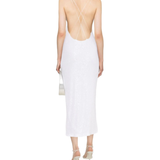 Woman wearing white sequin midi camisole dress with strappy heels — Rotate | Endless UAE