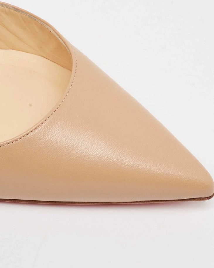 Beige kid leather pointed-toe pump with subtle stitching detail and low-cut vamp — Christian Louboutin | Endless UAE