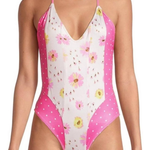 Pink and white floral print one piece swimsuit with polka dot side panels and halter straps — LoveShackFancy | Endless UAE