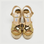 Gold metallic foil crisscross espadrille wedge sandals with ankle strap and woven jute platform — Jimmy Choo | Endless UAE