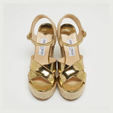 Gold metallic foil crisscross espadrille wedge sandals with ankle strap and woven jute platform — Jimmy Choo | Endless UAE