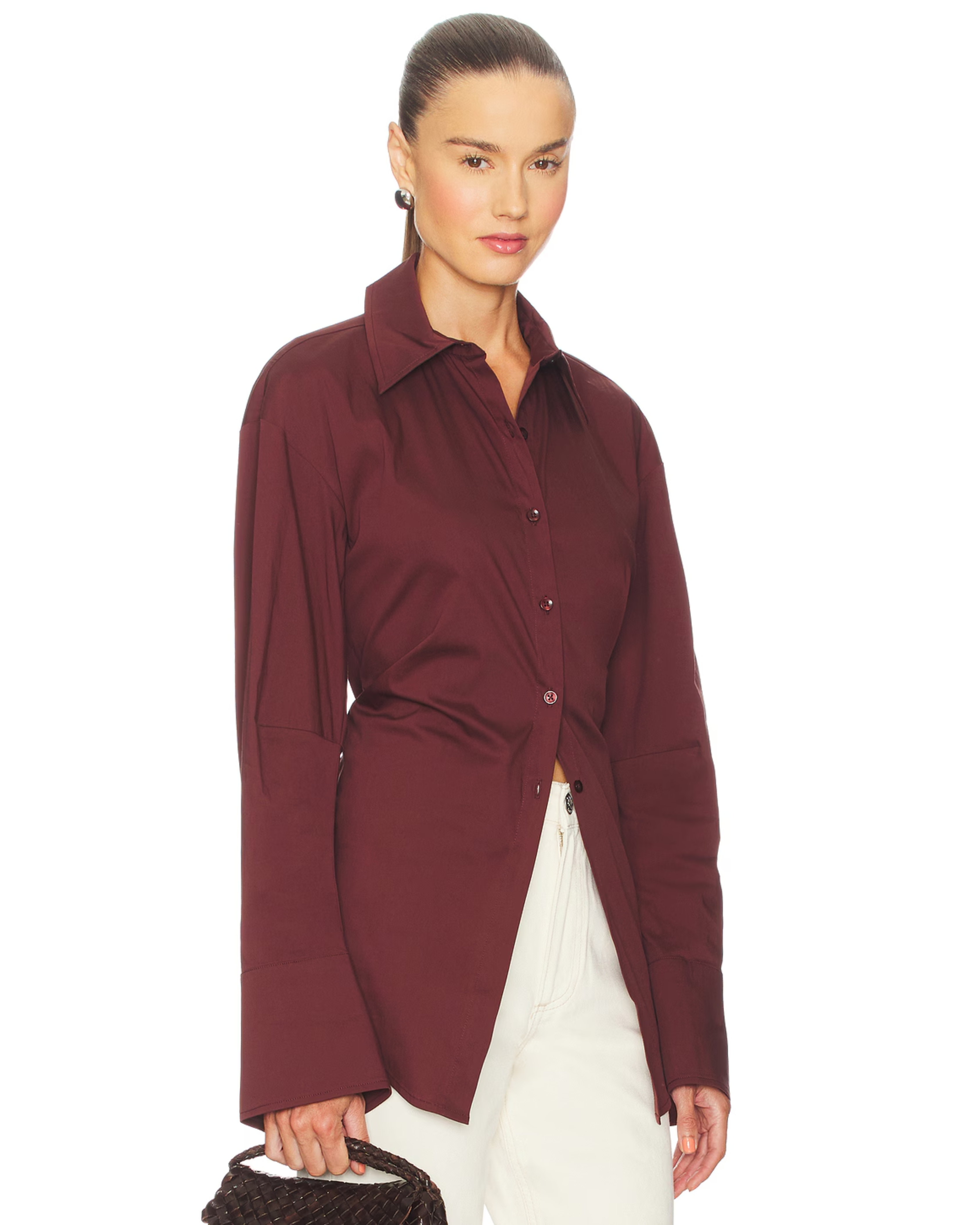Burgundy poplin button-up shirt styled with cream trousers and black bag — Simon Miller | Endless UAE