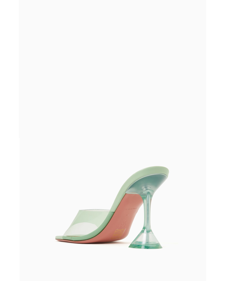 Lupita 95 Mules in translucent green PVC with sculptural heel — Amina Muaddi | Endless UAE