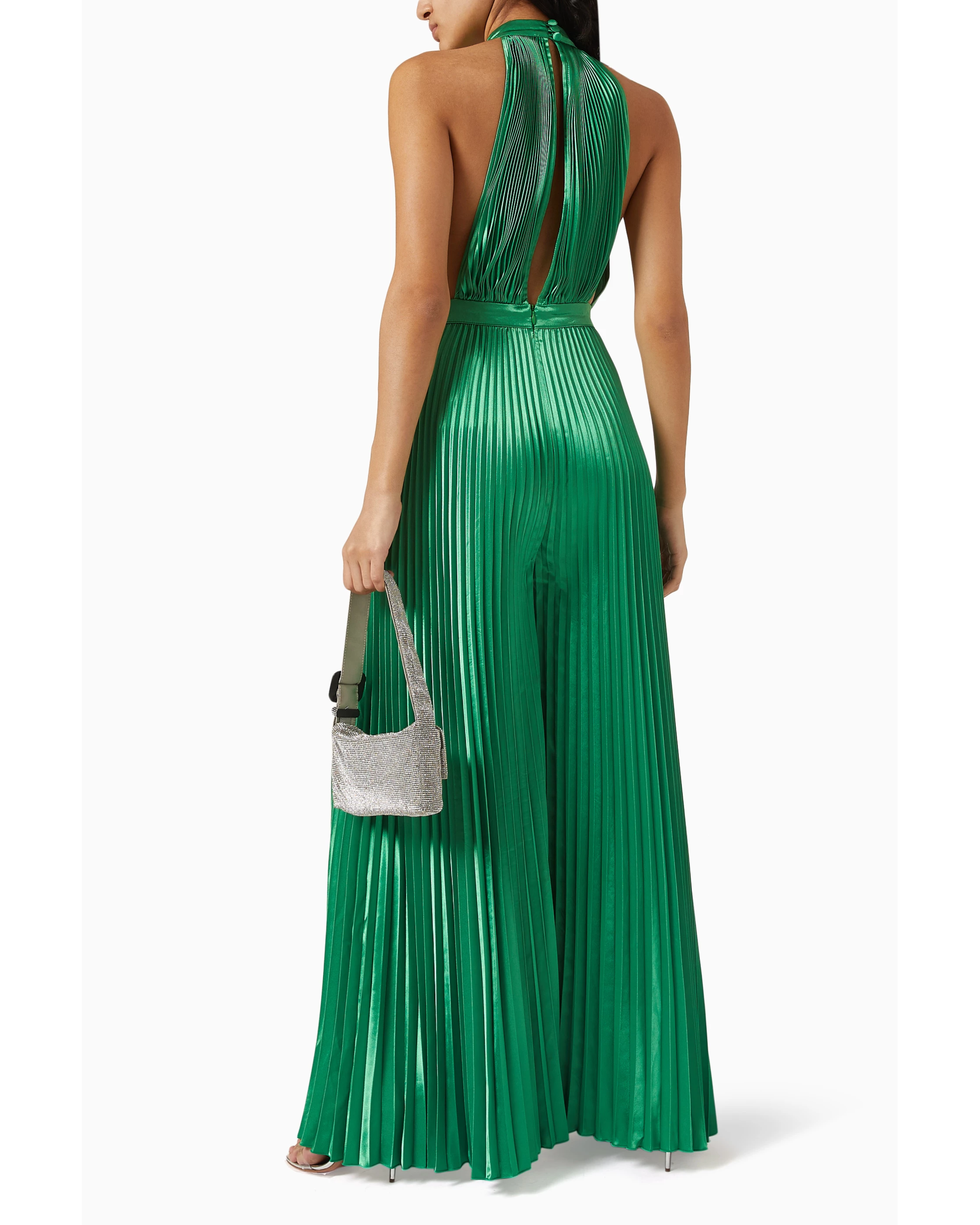 Green pleated halter jumpsuit with low back design — L'IDÉE | Endless UAE