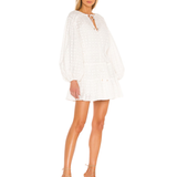 White mini dress with balloon sleeves, eyelet embroidery, and keyhole neckline tie — Significant Other | Endless UAE