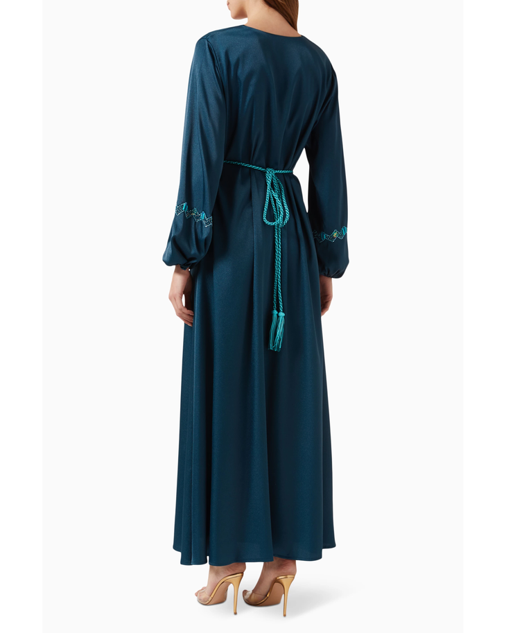 Teal long sleeve kaftan dress with embroidered belt and sleeve details on model — Nass | Endless UAE