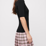 Black knit top with pink plaid wool skirt dress — Maje | Endless UAE