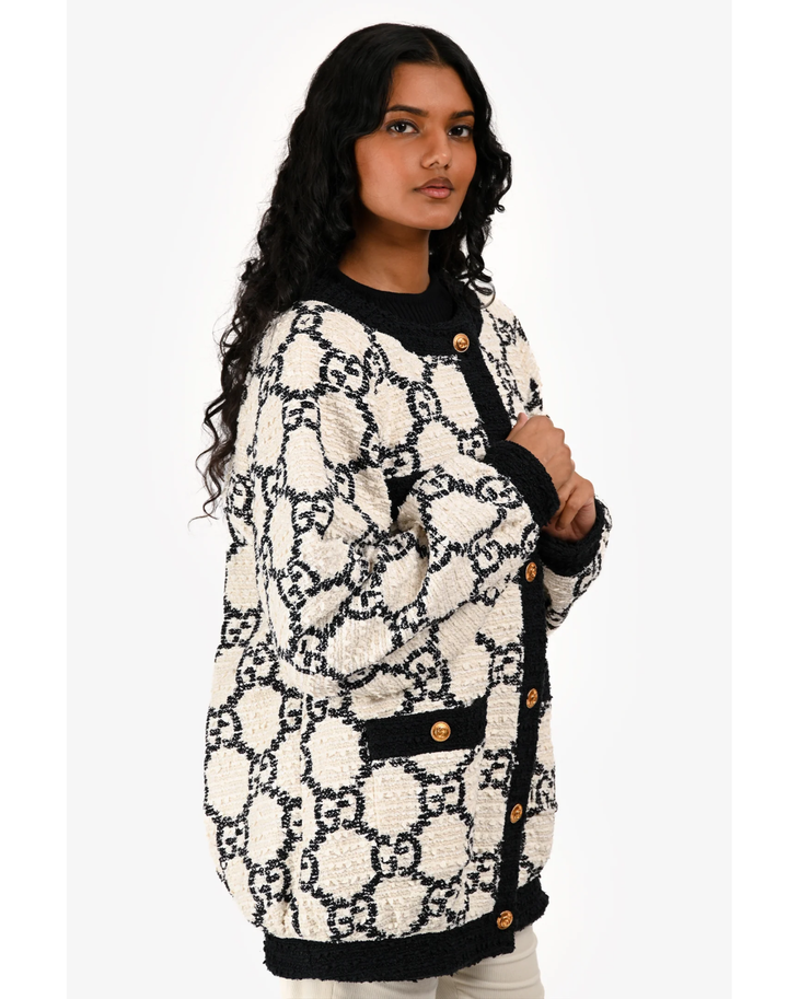 Gucci monogram logo bomber jacket in beige and black with gold button details and ribbed trim — Gucci | Endless UAE