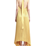 Woman wearing pleated marigold halter gown with high-low hemline — L'IDÉE | Endless UAE