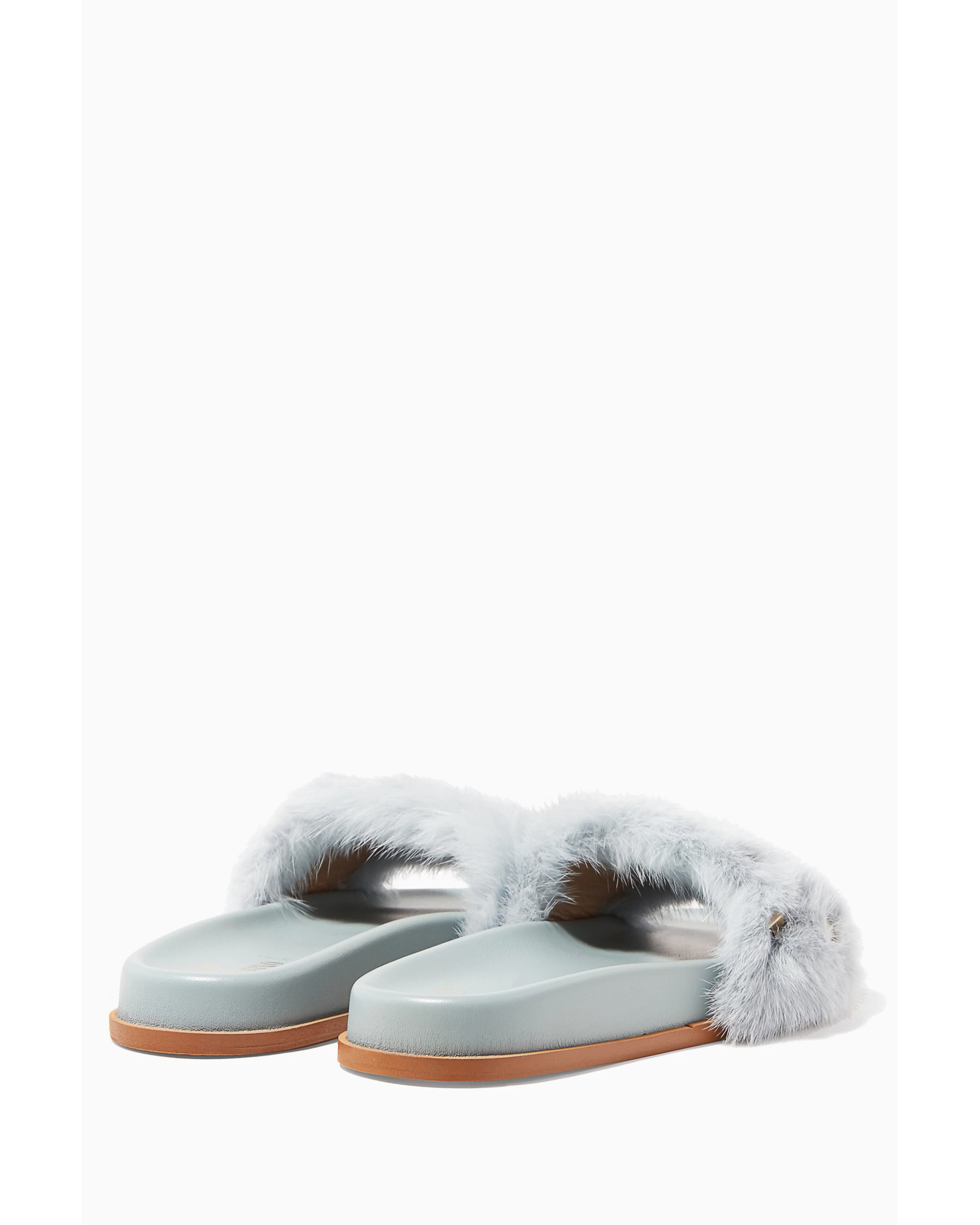Luxurious pale blue slides with fluffy mink fur straps and tan leather soles — Valentino Garavani | Endless UAE