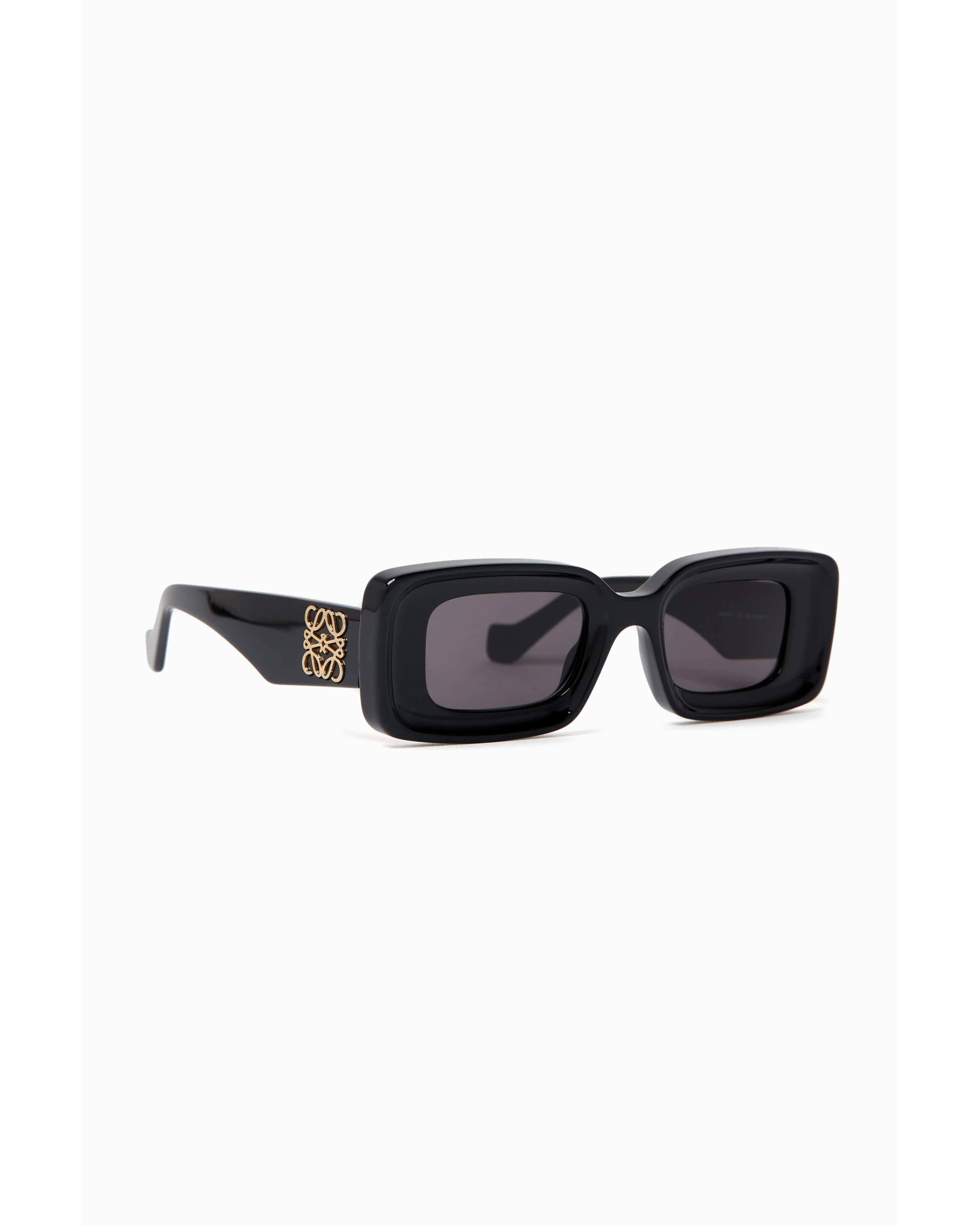 Black rectangular sunglasses with dark tinted lenses and thick frames — Loewe | Endless UAE