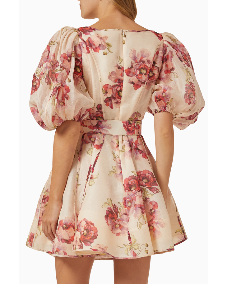Woman wearing a cream linen mini dress with pink floral print, puff sleeves, and belted waist — ZIMMERMANN | Endless UAE