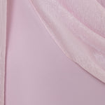 Woman wearing pink textured maxi dress in desert setting — Lichi | Endless UAE