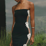 Black strapless maxi dress with white leaf cutouts down the side — Bahia Maria | Endless UAE