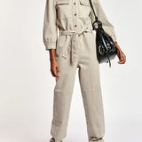 Beige denim jumpsuit with puffed sleeves and belt — Essentiel Antwerp | Endless UAE