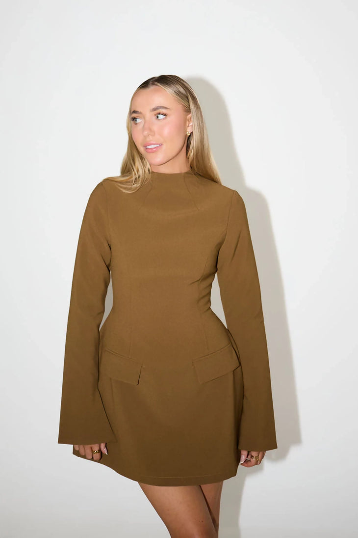 Woman wearing brown mock neck mini dress with bell sleeves and front pockets — Odd Muse | Endless UAE