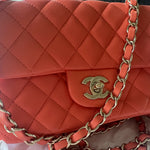Coral quilted lambskin mini classic handbag with gold CC logo — Chanel | Endless UAE