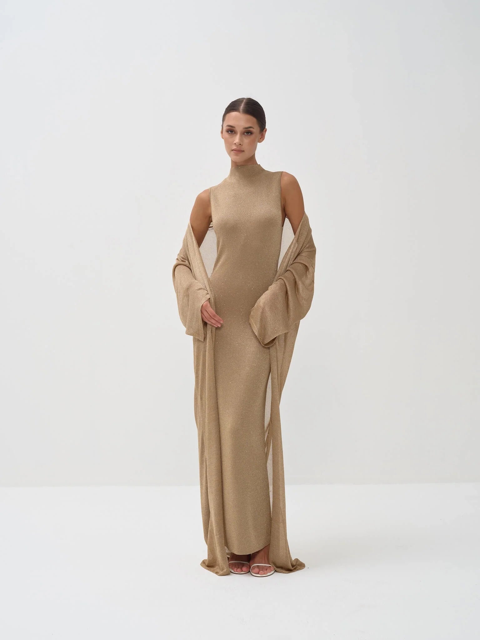 Elegant beige sleeveless maxi dress with matching duster cardigan in neutral tone — Nora The Label | Endless UAE