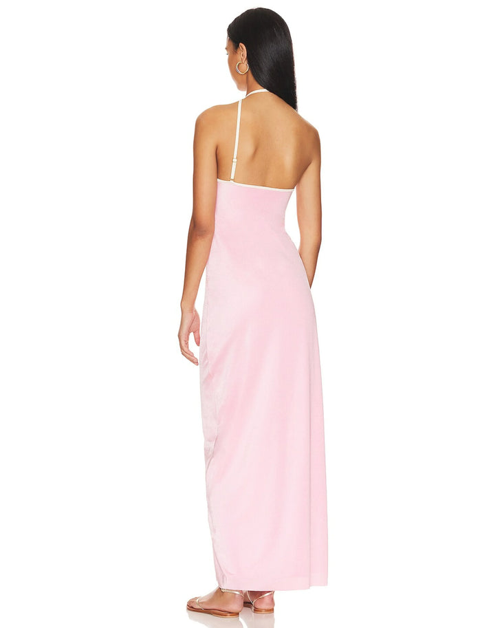 Woman wearing a pink halter neck maxi dress with a high slit — Baobab | Endless UAE