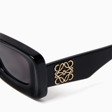 Black rectangular sunglasses with dark tinted lenses and thick frames — Loewe | Endless UAE