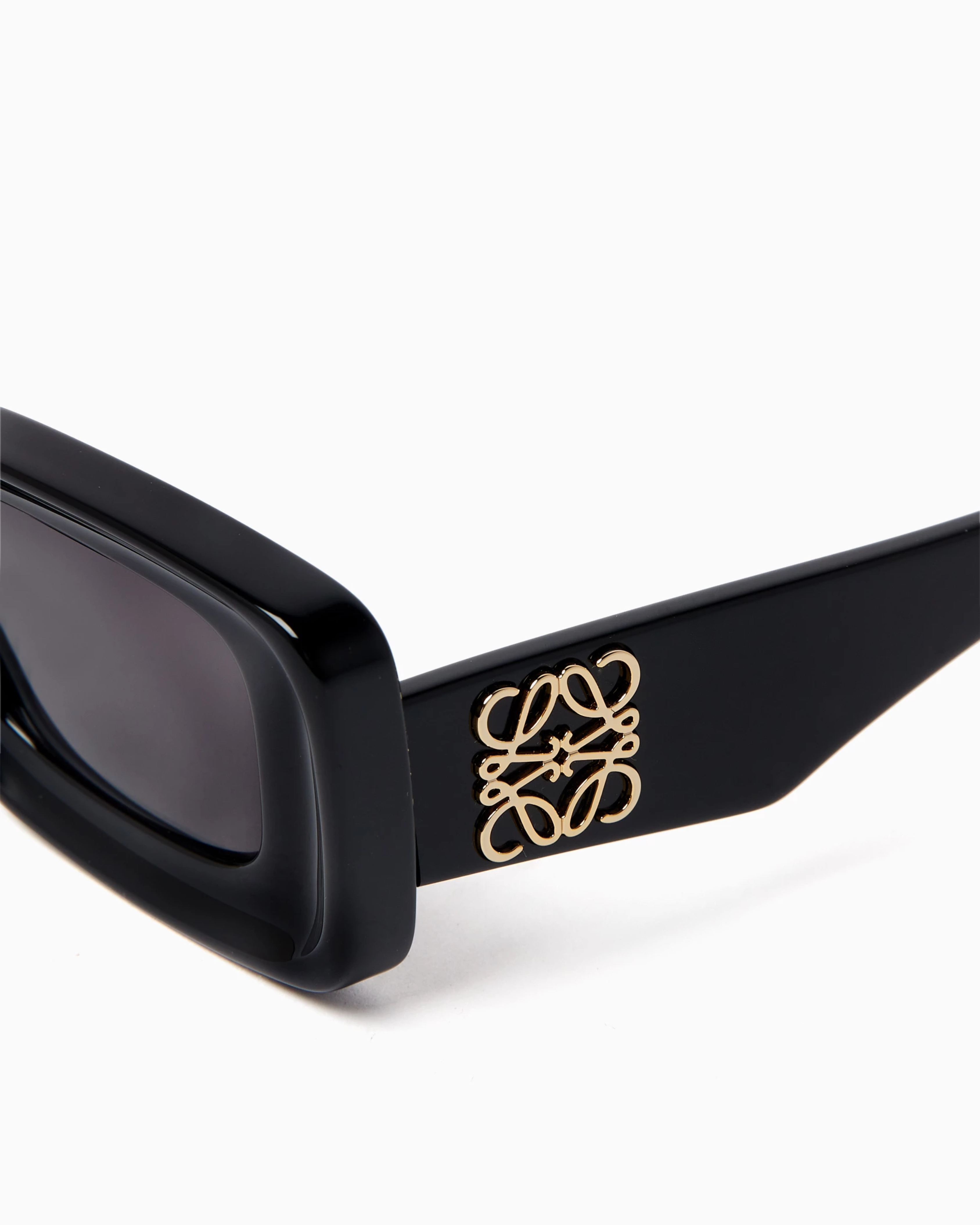 Black rectangular sunglasses with dark tinted lenses and thick frames — Loewe | Endless UAE