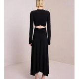 Black long-sleeve wrap midi dress with cutout details and white slide sandals — A.L.C | Endless UAE
