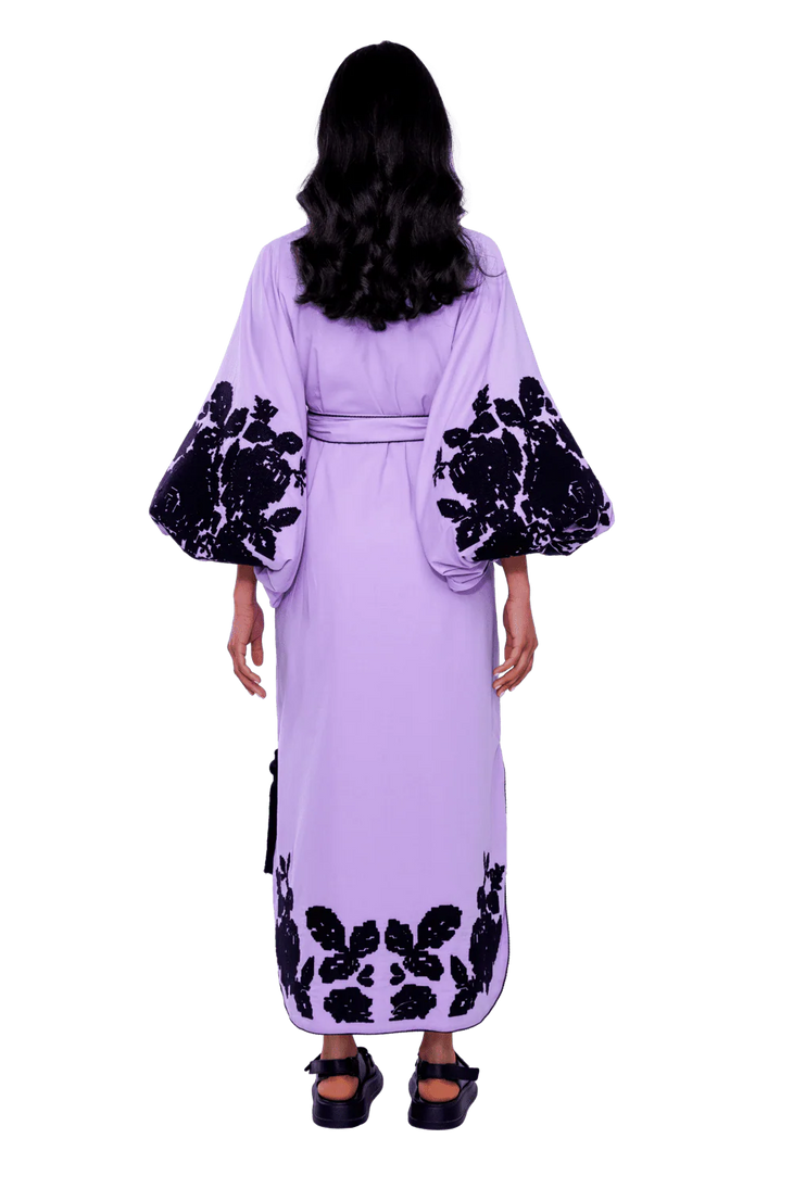 Back view of lilac cotton caftan with black rose embroidery on sleeves and hem, belted waist — Yuliya Magdych | Endless UAE