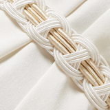 Elegant cream braided belt detail with interwoven design on ivory fabric background — Nass | Endless UAE