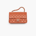 Coral quilted lambskin mini classic handbag with gold CC logo — Chanel | Endless UAE