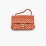 Coral quilted lambskin mini classic handbag with gold CC logo — Chanel | Endless UAE