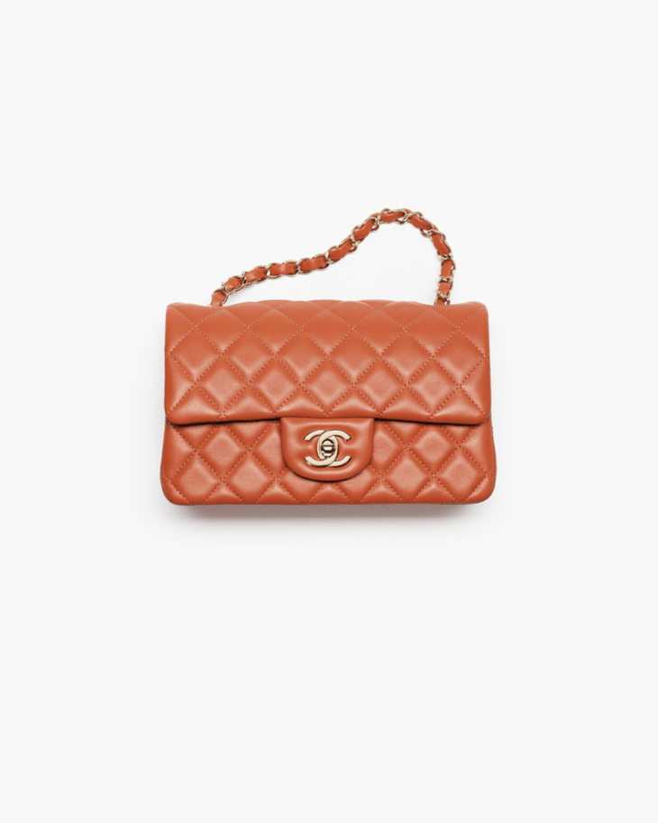Coral quilted lambskin mini classic handbag with gold CC logo — Chanel | Endless UAE