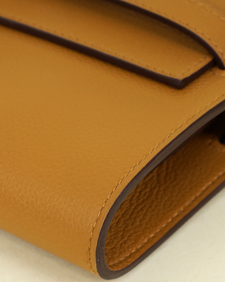 Sesame yellow leather Hermes Kelly To Go Evercolor wallet with brown piping detail and stitching — Hermes | Endless UAE