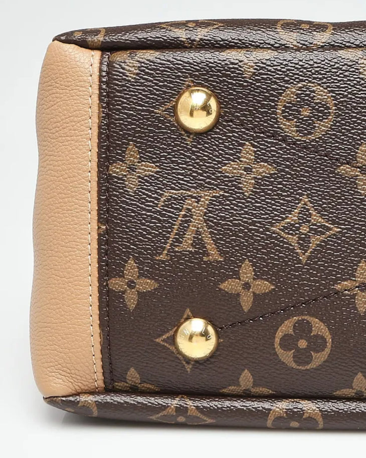 Louis Vuitton Pallas bag corner detail showing monogram canvas with beige leather trim and gold brass studs — Louis Vuitton | Endless UAE