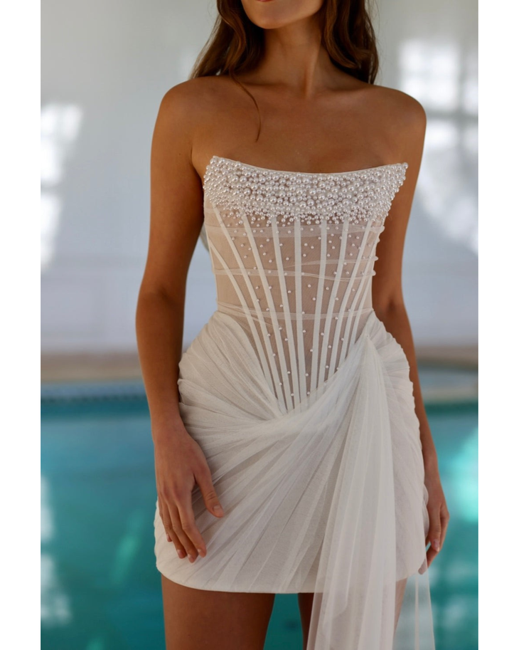 Strapless white mini dress with pearl embellished bodice and draped tulle skirt detail — Rosie Etienne | Endless UAE