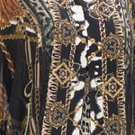 Ornate black and gold patterned co-ord set with chain and animal print details — Camilla | Endless UAE