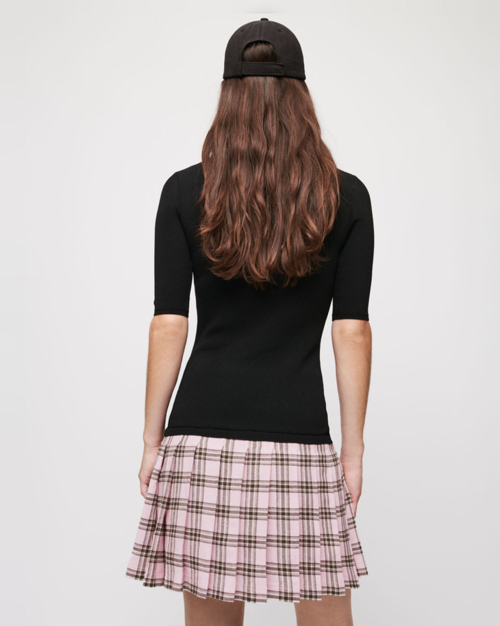 Black knit top with pink plaid wool skirt dress — Maje | Endless UAE