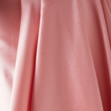 Imani Strapless Gown in pink satin fabric with draped folds and elegant texture — Solace London | Endless UAE