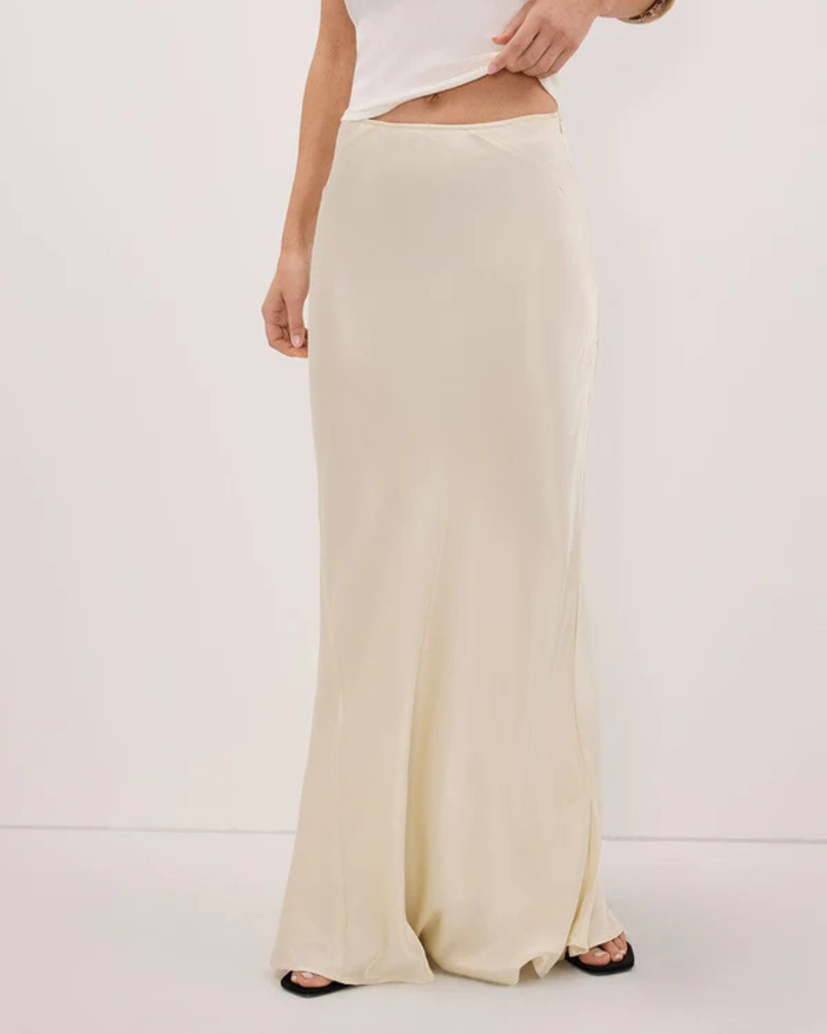 Charli Satin Maxi Skirt in cream worn with matching top — Dissh | Endless UAE