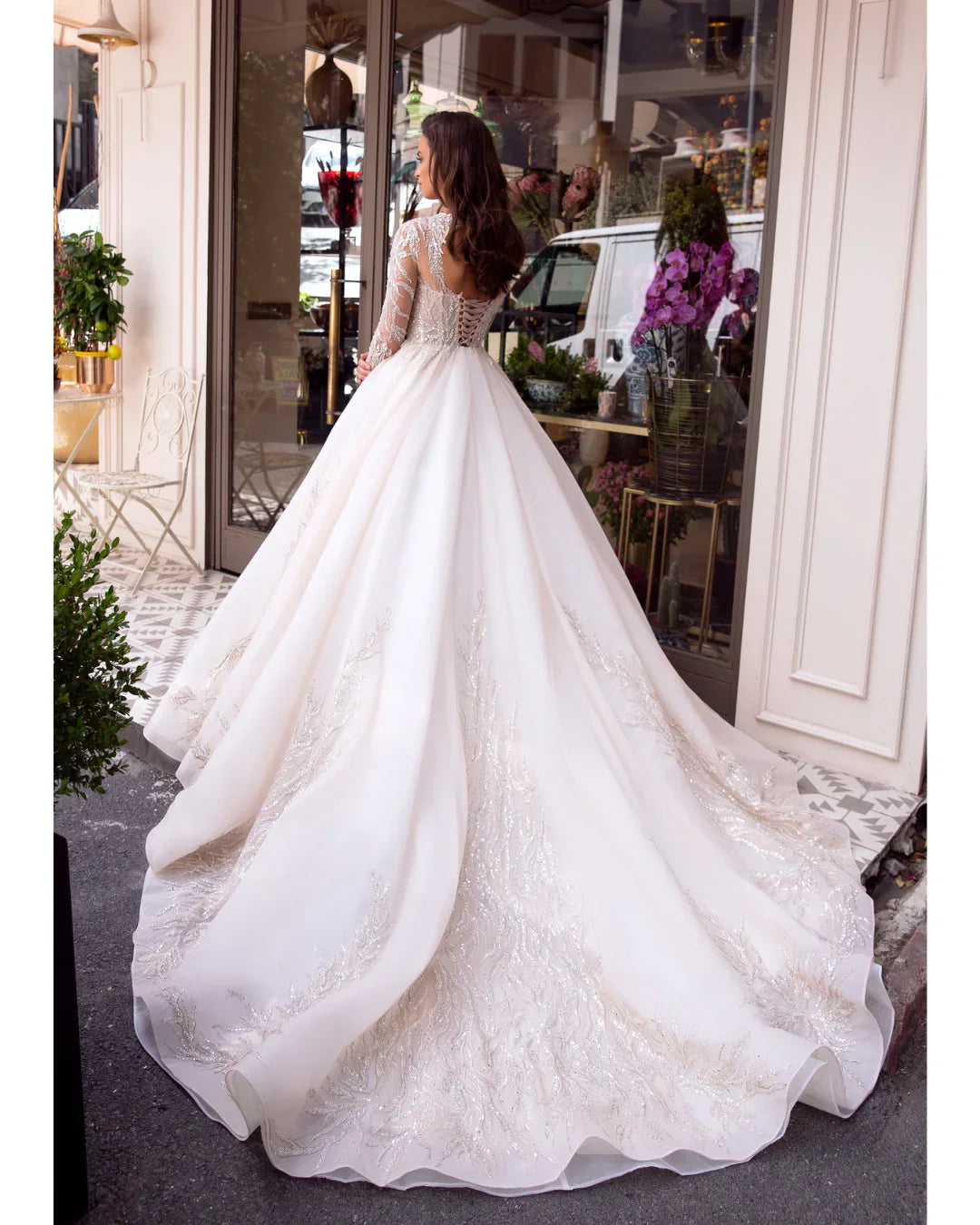Elegant white wedding dress with beaded lace bodice and flowing ball gown skirt — Mar©a Anette | Endless UAE