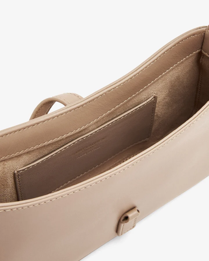 Beige leather mini hobo bag with interior slip pocket and stitched detailing — Yves Saint Laurent | Endless UAE