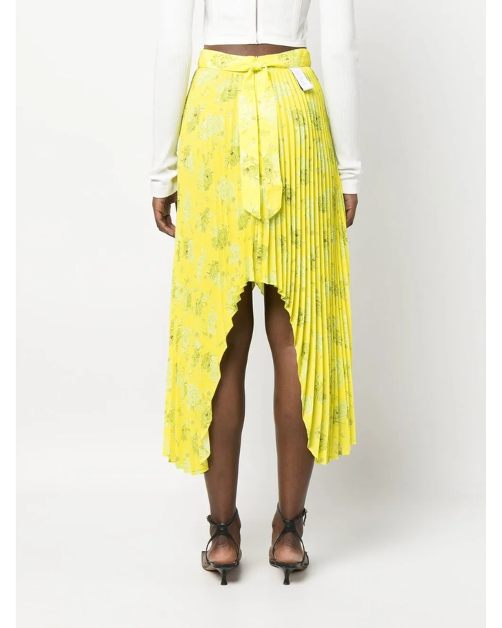 Bright yellow pleated midi skirt with asymmetric high-low hemline and tie waist detail, shown from back — Rokh | Endless UAE