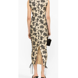 Elena Midi Dress with black leaf print, high neckline, sleeveless cut, and lace-up side details — De La Vali | Endless UAE