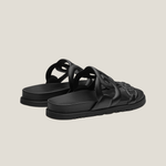 Black leather Techno Sandal with cutout straps and flat sole — Hermes | Endless UAE