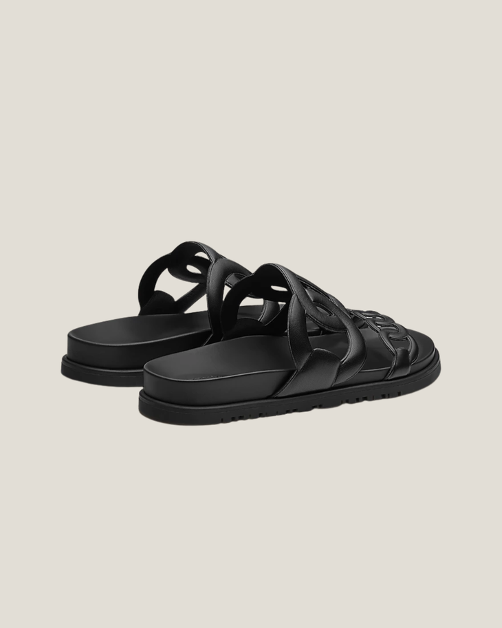 Black leather Techno Sandal with cutout straps and flat sole — Hermes | Endless UAE