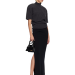 Black leather Knot Chiquito bag with curved handles and gold branding — Jacquemus | Endless UAE