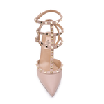 Nude leather Rockstud pumps with pyramid stud straps and buckle details — Valentino Garavani | Endless UAE