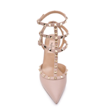 Nude leather Rockstud pumps with pyramid stud straps and buckle details — Valentino Garavani | Endless UAE
