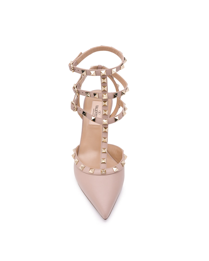 Nude leather Rockstud pumps with pyramid stud straps and buckle details — Valentino Garavani | Endless UAE